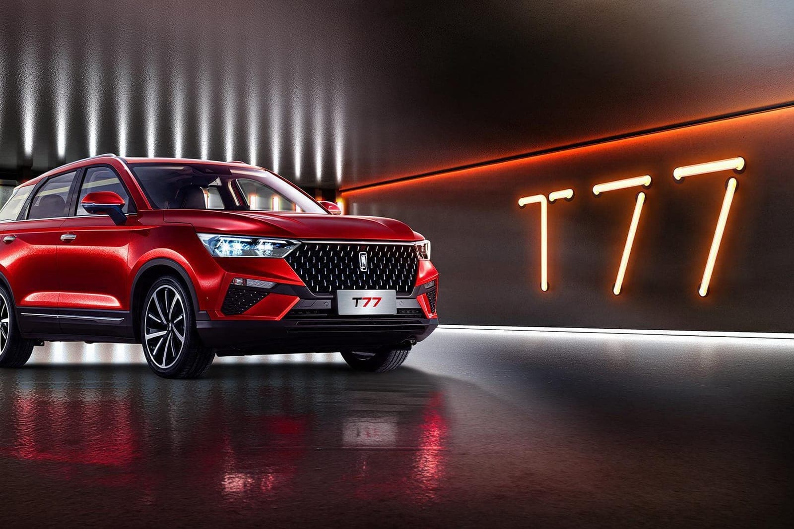 La Bestune T77 Rosso Quantum di tre quarti, in uno studio con la scritta T77 al neon